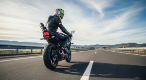 Motorcycle rider practicing defensive riding techniques on a safe, open road
